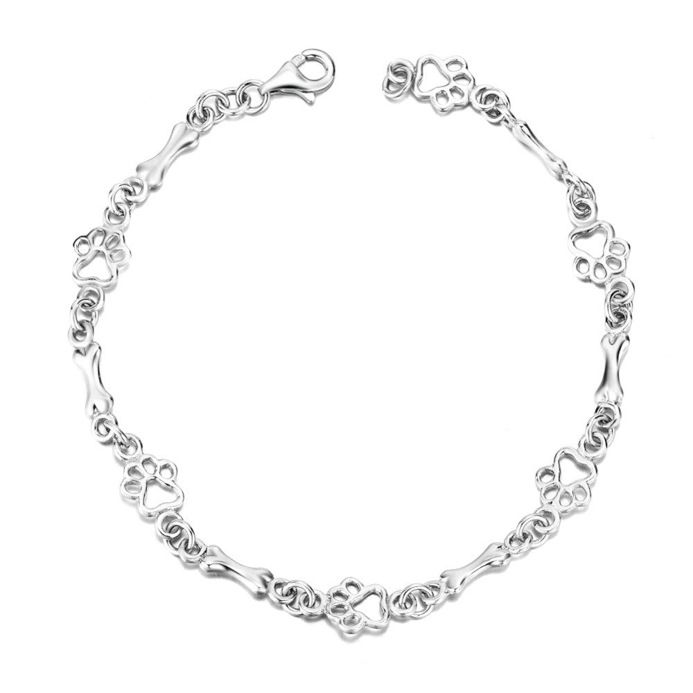 ZILVEREN HONDENPOOT EN BOT BEDELARMBAND