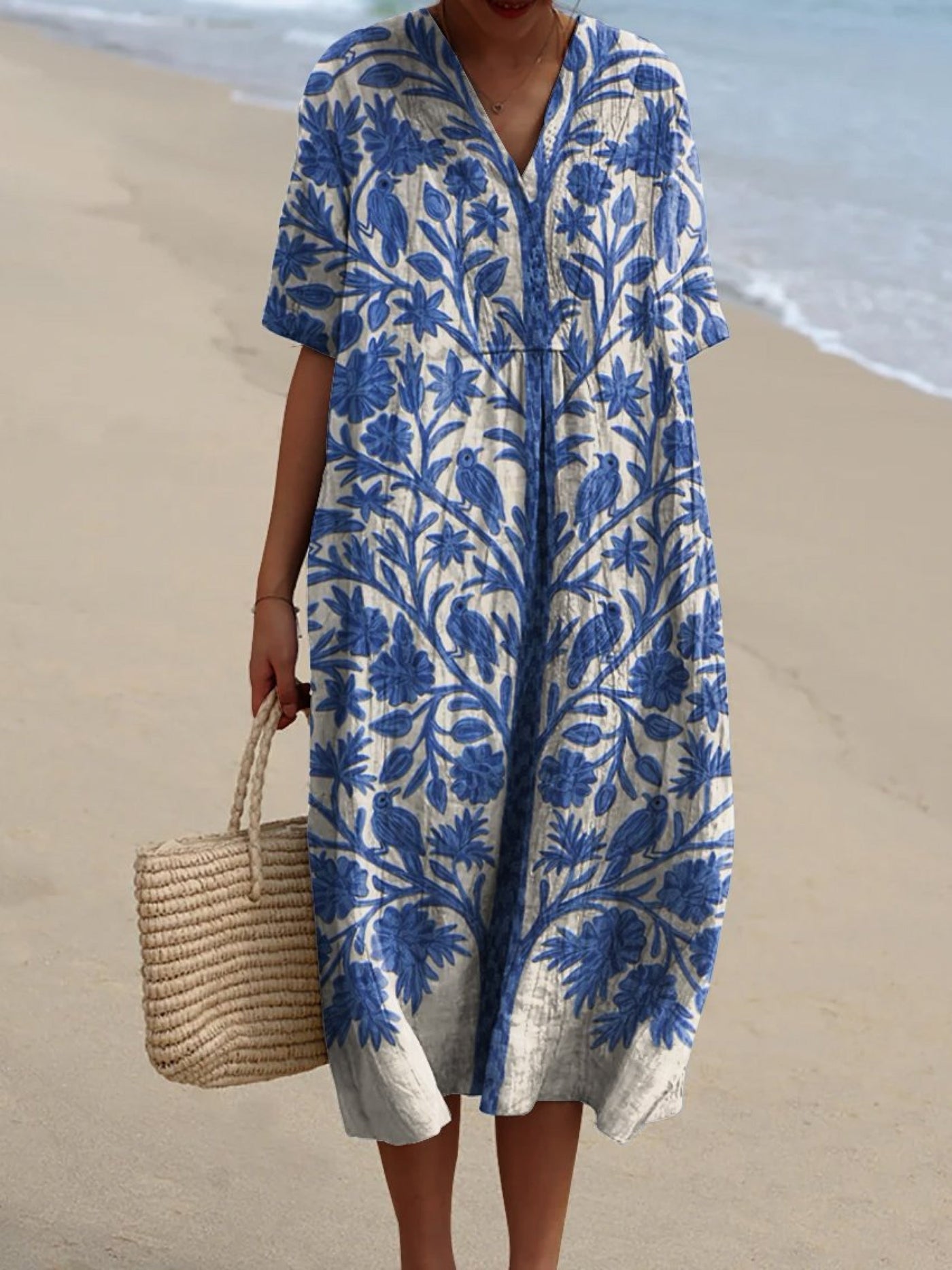 Clara | Blauwe botanische jurk